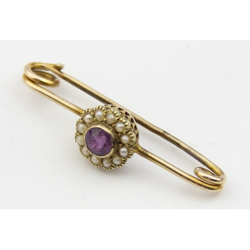 1139 - An antique 9ct gold, seed pearl and amethyst bar brooch, indistinctly marked and XRF confirmed, pres... 