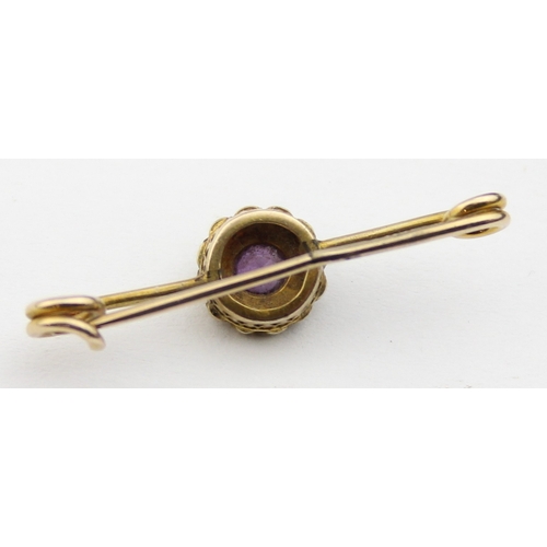 1139 - An antique 9ct gold, seed pearl and amethyst bar brooch, indistinctly marked and XRF confirmed, pres... 