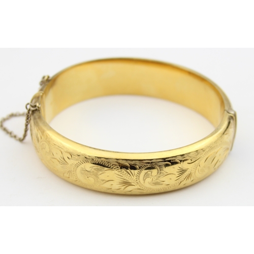 1145 - 3 assorted vintage gold plated bangles, 2 marked rolled gold, one marked 1/5th 9ct gold metal core, ... 