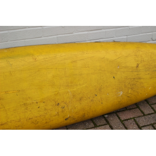 742 - A long yellow fiberglass canoe or kayak, approx 405cm long