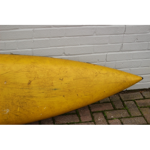 742 - A long yellow fiberglass canoe or kayak, approx 405cm long