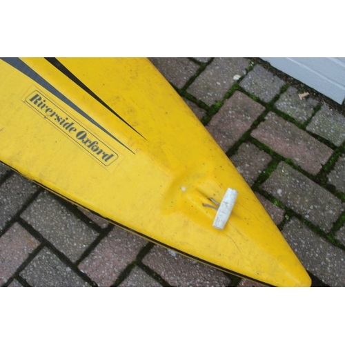 742 - A long yellow fiberglass canoe or kayak, approx 405cm long