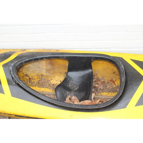 742 - A long yellow fiberglass canoe or kayak, approx 405cm long