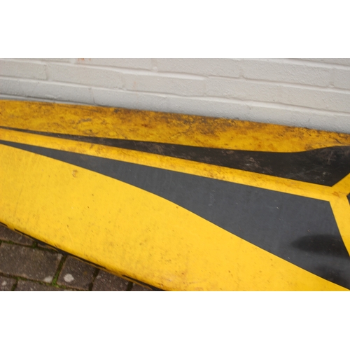 742 - A long yellow fiberglass canoe or kayak, approx 405cm long