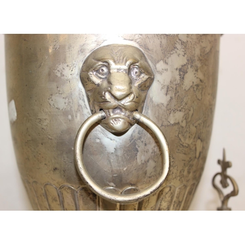 1099P - A vintage silver plated samovar or tea urn of classical form with lion mask handles, seemingly unmar... 