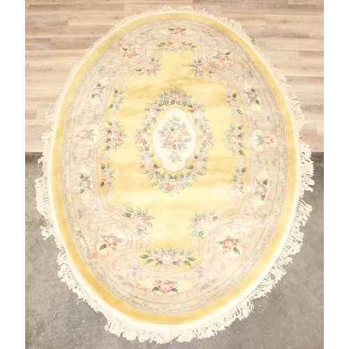 222 - A large vintage deep pile Chinese superwash style rug of yellow and cream ground, approx 295cm x 198... 