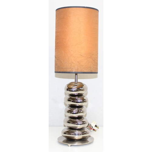 268D - A retro style table lamp formed as stacked chrome effect pebbles, indistinctly marked to base, appro... 