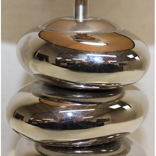 268D - A retro style table lamp formed as stacked chrome effect pebbles, indistinctly marked to base, appro... 