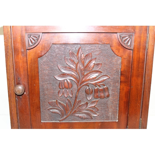 288 - An Arts & Crafts period mahogany table cabinet with floral carved door, later interior, approx 41cm ... 