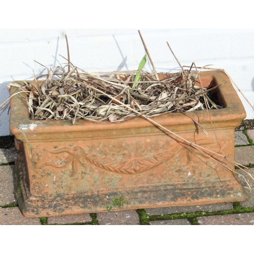 308 - An antique style oblong shaped terracotta garden trough planter, approx 47cm wide x 24cm deep x 21cm... 