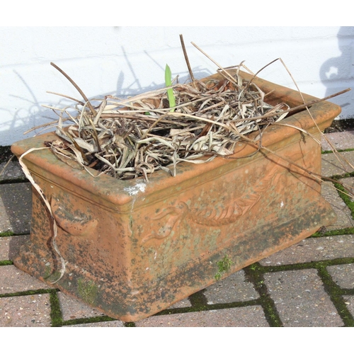 308 - An antique style oblong shaped terracotta garden trough planter, approx 47cm wide x 24cm deep x 21cm... 