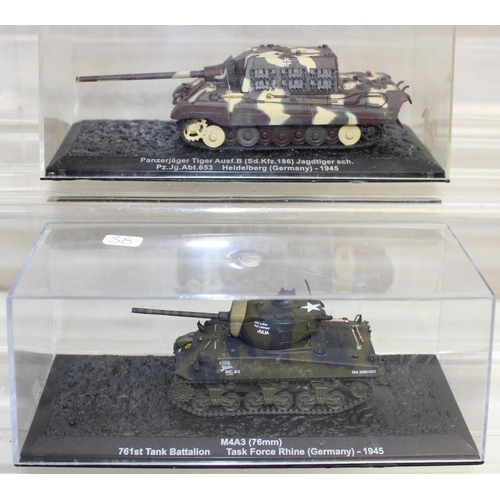 649 - Quantity of scale model WWII military vehicles to include M16 MGMC half-track, M4A3 Sherman tank plu... 