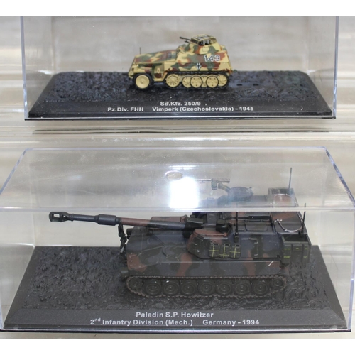 651 - Quantity of scale model WWII military vehicles to include Paladin SP howitzer, Churchill Mk VII tank... 