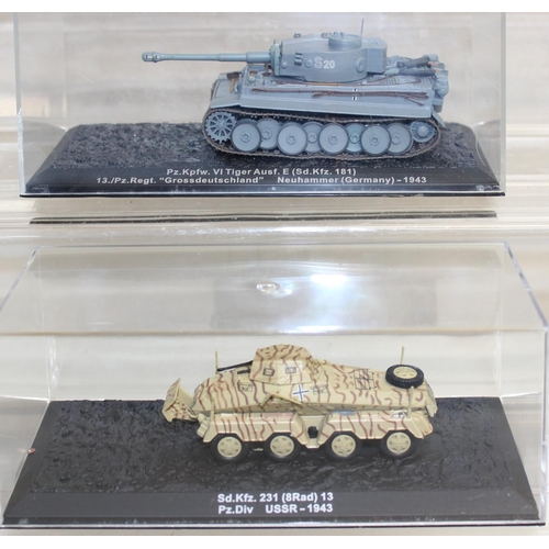 651 - Quantity of scale model WWII military vehicles to include Paladin SP howitzer, Churchill Mk VII tank... 