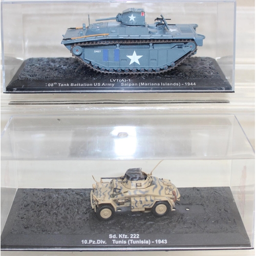 651 - Quantity of scale model WWII military vehicles to include Paladin SP howitzer, Churchill Mk VII tank... 