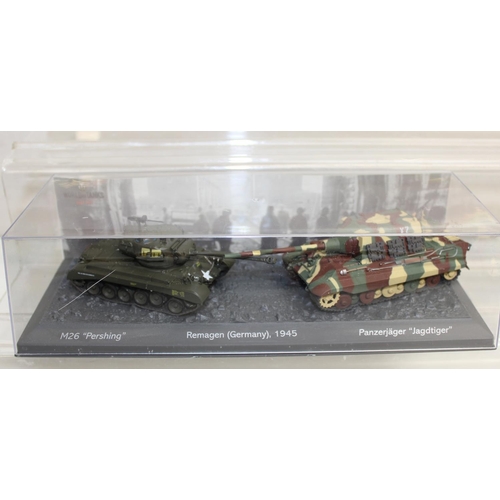 651 - Quantity of scale model WWII military vehicles to include Paladin SP howitzer, Churchill Mk VII tank... 