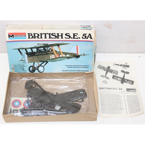 652 - 4 vintage model kits of WW1 bi-planes, 3 by Monogram, unchecked for completeness