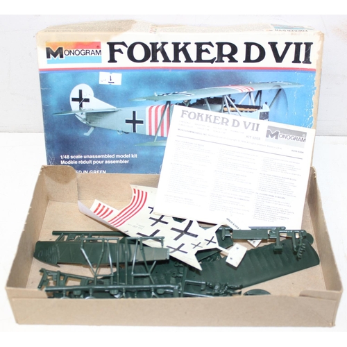 652 - 4 vintage model kits of WW1 bi-planes, 3 by Monogram, unchecked for completeness