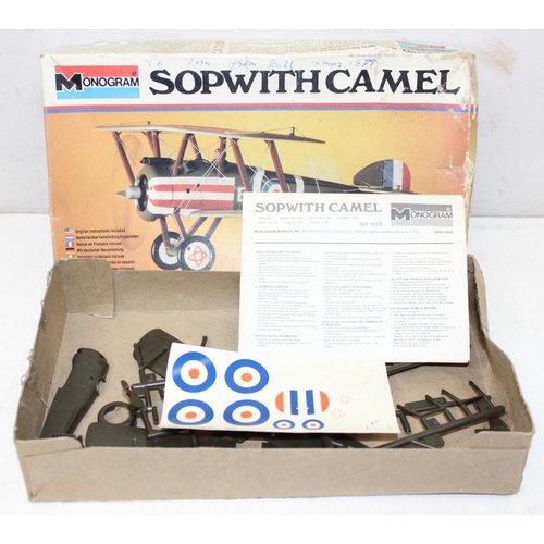 652 - 4 vintage model kits of WW1 bi-planes, 3 by Monogram, unchecked for completeness