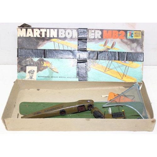 652 - 4 vintage model kits of WW1 bi-planes, 3 by Monogram, unchecked for completeness