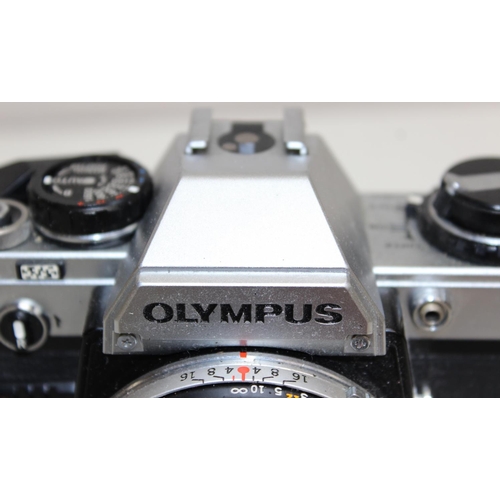 751 - A vintage Olympus OM10 camera with OM System 1:1.8 f=50mm lens