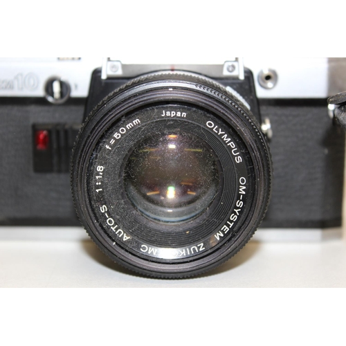 751 - A vintage Olympus OM10 camera with OM System 1:1.8 f=50mm lens