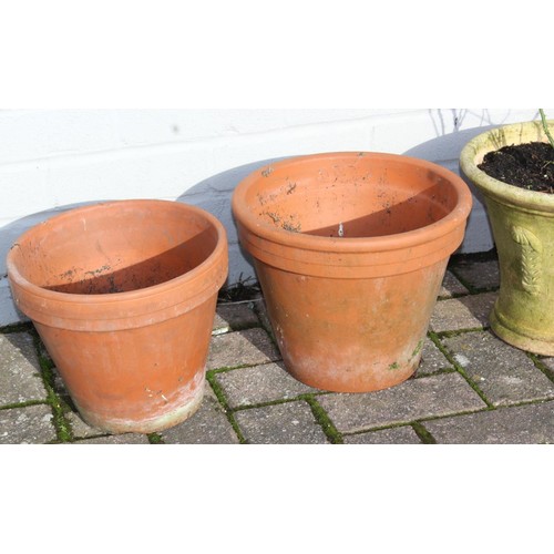 311 - 6 assorted larger sized garden plant pots, mainly terracotta, the tallest approx 26cm in diameter x ... 