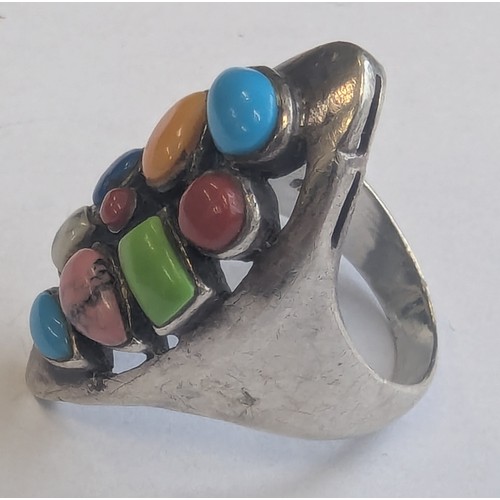 1149 - A retro style 925 silver ring set with a large number of multi-coloured cabochon stones, possibly Am... 