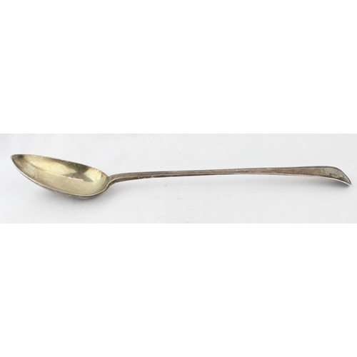 1099 - A Georgian silver basting spoon with thread border and engraved crest, marked for London 1790 by Pet... 