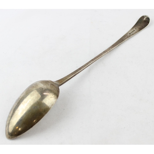 1099 - A Georgian silver basting spoon with thread border and engraved crest, marked for London 1790 by Pet... 