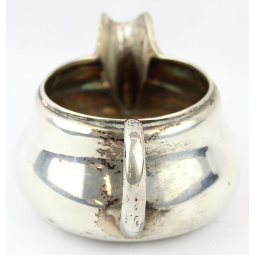 1099I - A Danish silver cream jug, marked to base and XRF confirmed, approx 12cm wide, approx 89.26g gross