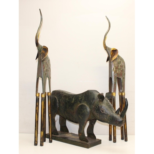 1583 - 3 reclaimed metal animal sculptures to include a Rhino and 2 elephants, elephants approx 80cm tall