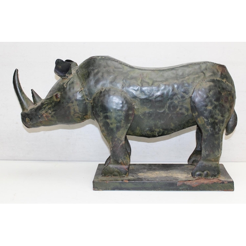 1583 - 3 reclaimed metal animal sculptures to include a Rhino and 2 elephants, elephants approx 80cm tall