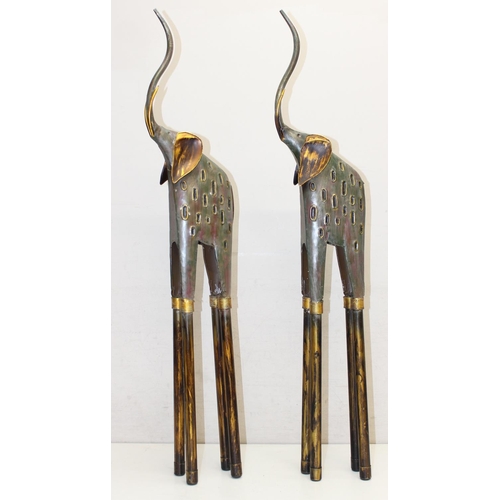 1583 - 3 reclaimed metal animal sculptures to include a Rhino and 2 elephants, elephants approx 80cm tall