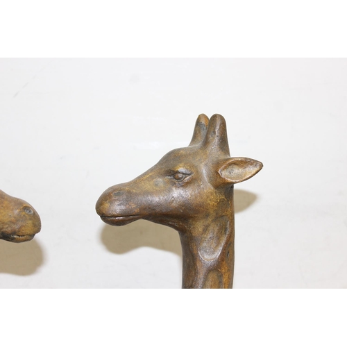 1584 - Vintage bronzed effect model of 2 loving giraffes, approx 42cm tall