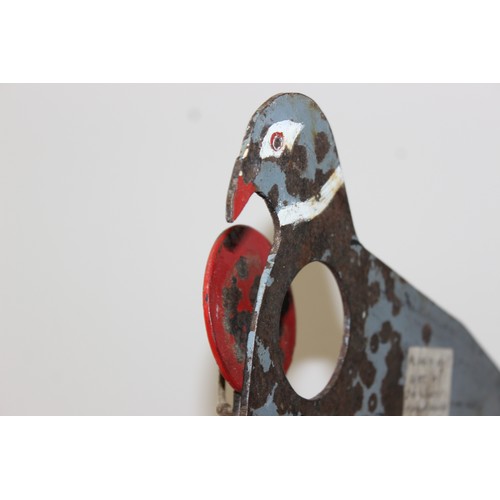 1359 - A vintage folk art painted metal air rifle target of a pigeon mounted with a bell and a vintage Hane... 