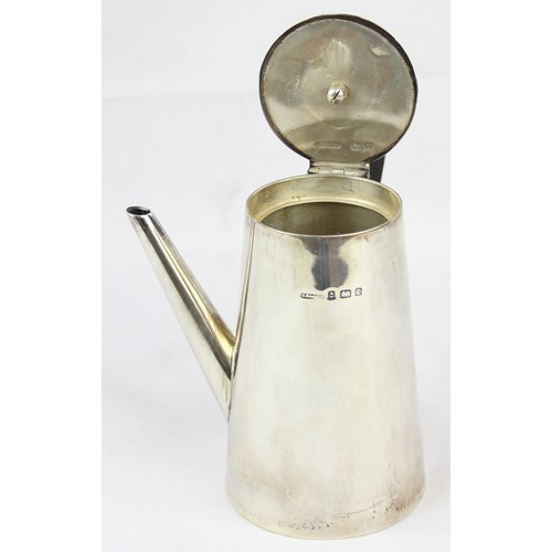 1097 - An Edwardian silver chocolate pot with angular ebony handle to the side, marked for Birmingham 1902 ... 