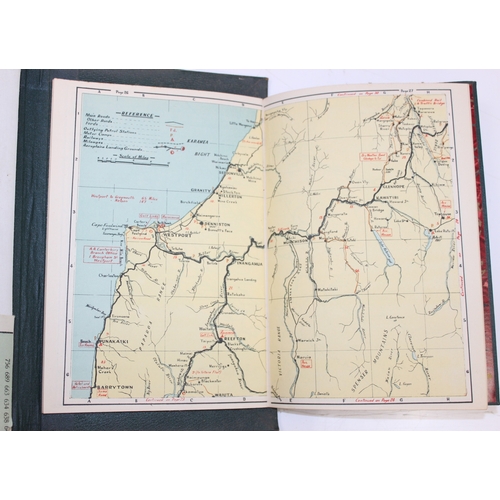 18 - A vintage leather bound New Zealand road map set showing both the North & South Islands, the gilt to... 