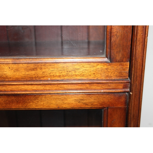 39 - An early 20th century Globe Wernicke style 4 section glazed mahogany bookcase by Kenrick & Jefferson... 