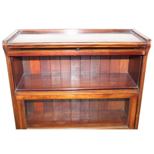 39 - An early 20th century Globe Wernicke style 4 section glazed mahogany bookcase by Kenrick & Jefferson... 