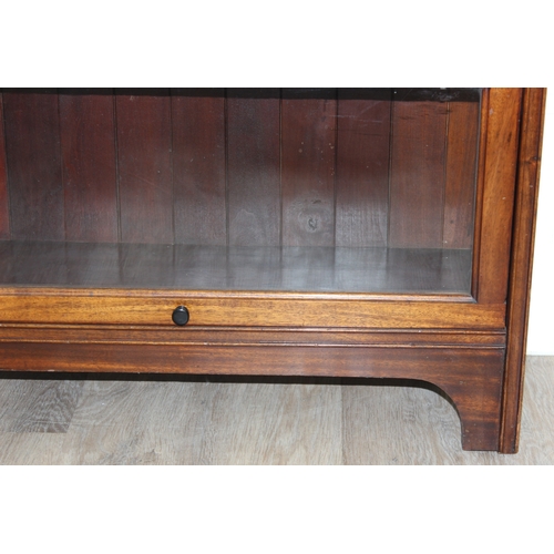 39 - An early 20th century Globe Wernicke style 4 section glazed mahogany bookcase by Kenrick & Jefferson... 