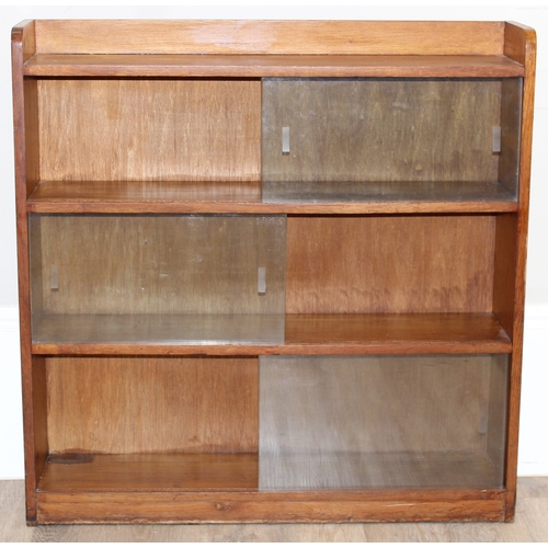 38 - A mid-century retro glazed 2 door bookcase, seemingly unmarked, approx 91cm wide x 22cm deep x 92cm ... 