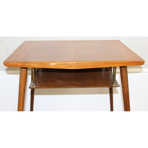 77 - An unusual mid-century side table with under tier or magazine rack, seemingly unmarked, approx 61cm ... 