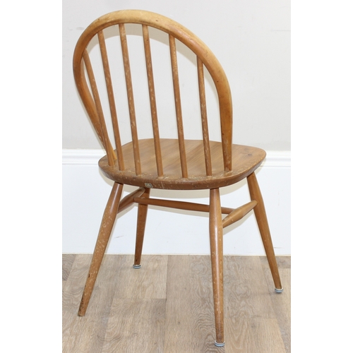 27 - A pair of retro Ercol hoop-back dining chairs, blonde finish, blue & gold labels, approx 83cm tall