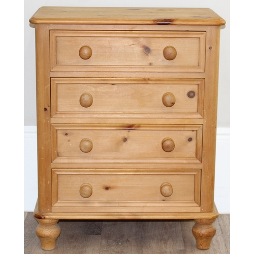 51 - A modern solid pine four drawer chest of drawers with turned handles and bun feet, approx 66cm wide ... 