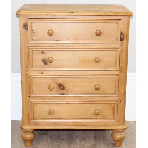 50 - A modern solid pine four drawer chest of drawers with turned handles and bun feet, approx 66cm wide ... 