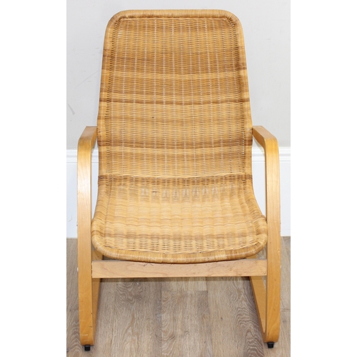 83 - A Scandinavian designed wicker chair with bentwood cantilever base, approx 58cm wide x 88cm tall