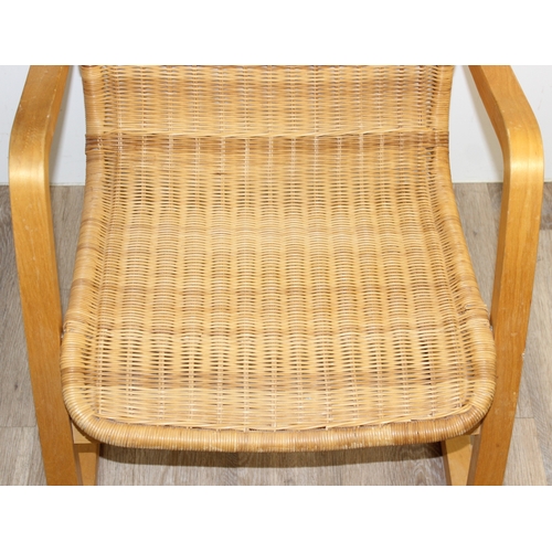 83 - A Scandinavian designed wicker chair with bentwood cantilever base, approx 58cm wide x 88cm tall