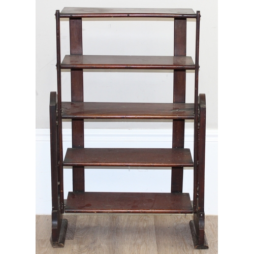 198F - An early 20th century mahogany bookcase or metamorphic shelving unit, previously able to move but me... 