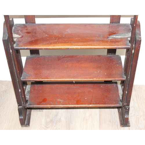 198F - An early 20th century mahogany bookcase or metamorphic shelving unit, previously able to move but me... 